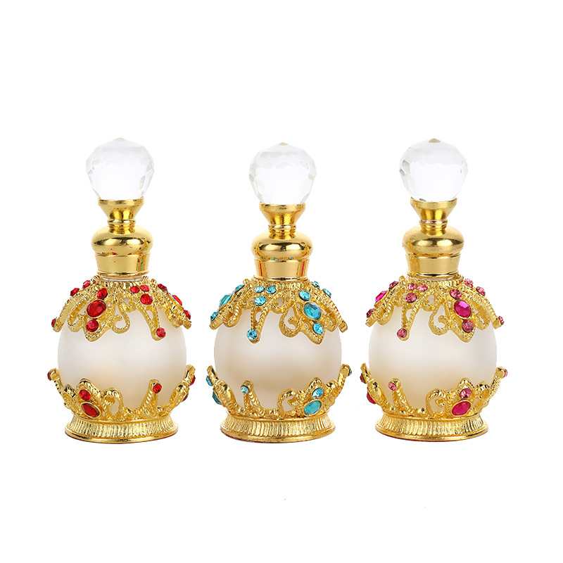 Fancy Metal Gold Empty Zinc Alloy Crystal Luxury Portable Arabic Perfume Bottle Wholesale